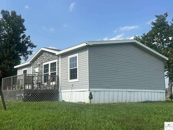 10 Acres of Land with Home for Sale in Urich, Missouri