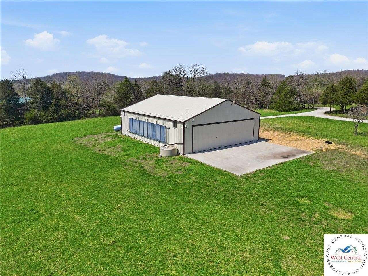 120 Acres of Recreational Land with Home for Sale in Warsaw, Missouri