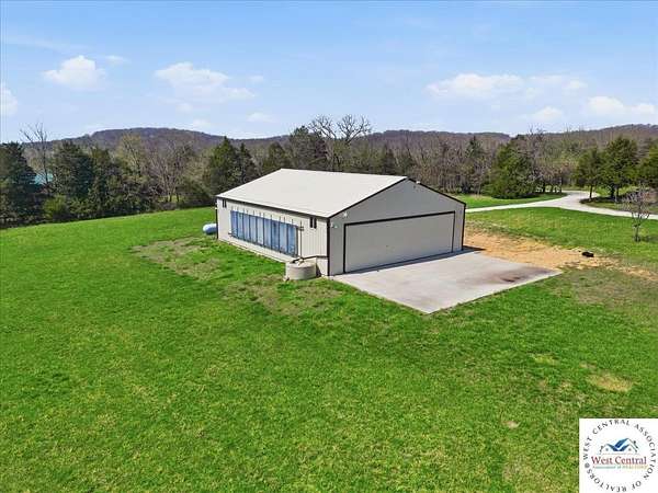 120 Acres of Recreational Land with Home for Sale in Warsaw, Missouri