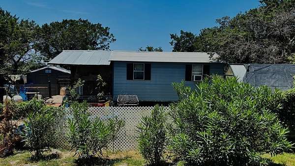 15.4 Acres of Land with Home for Sale in Kerrville, Texas