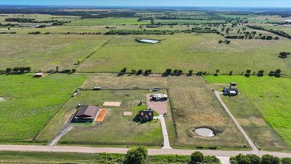 10 Acres of Recreational Land with Home for Sale in Blum, Texas