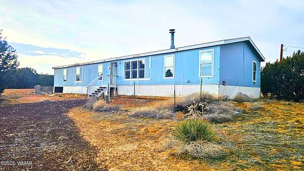 2 Acres of Land with Home for Sale in Concho, Arizona