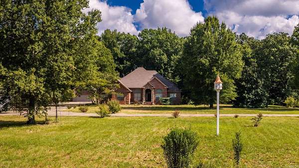 8.43 Acres of Land with Home for Sale in Greenbrier, Arkansas