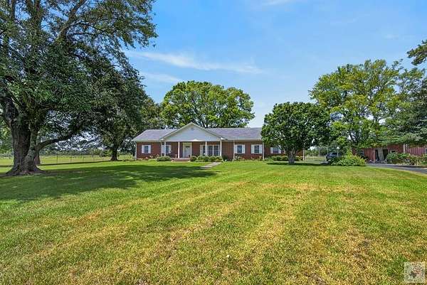 6.65 Acres of Land with Home for Sale in De Kalb, Texas