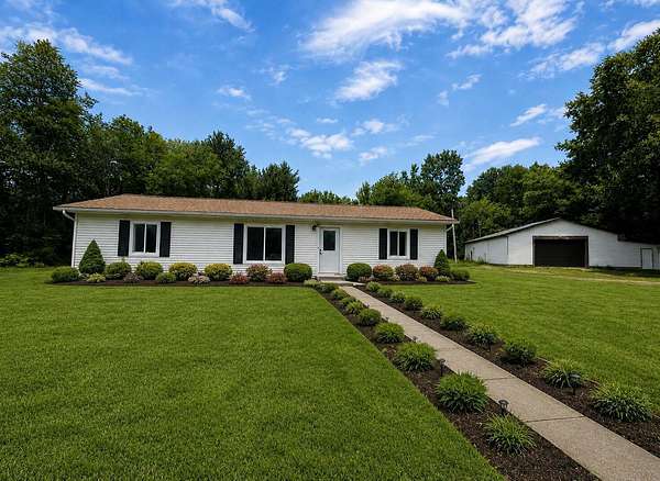 10.4 Acres of Land with Home for Sale in Oxford, Michigan