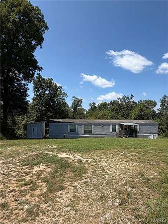 2.85 Acres of Land with Home for Sale in St. Robert, Missouri