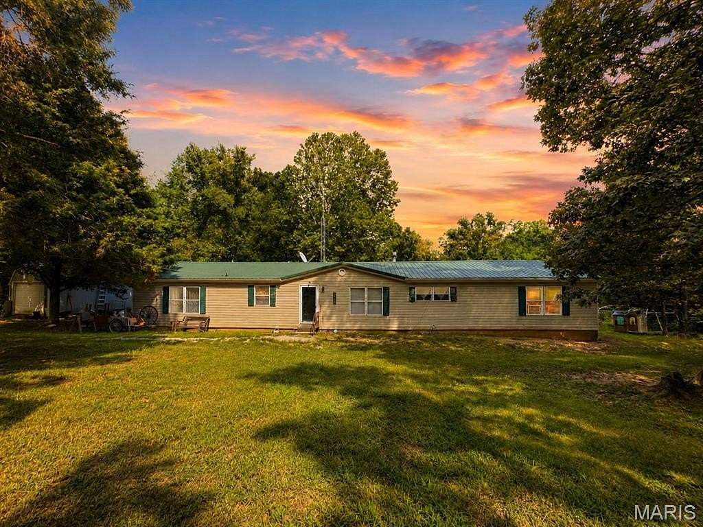 9.2 Acres of Land with Home for Sale in De Soto, Missouri