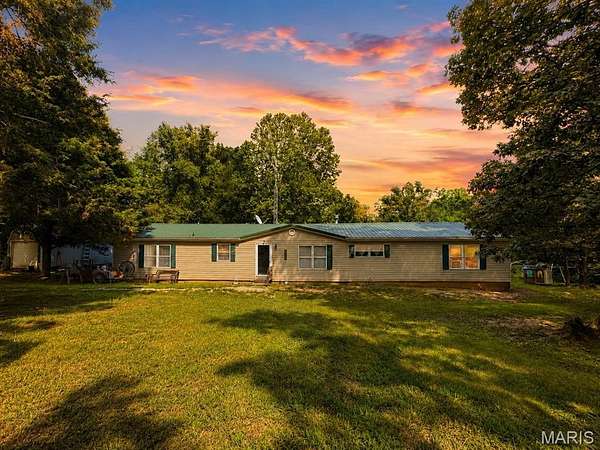 9.2 Acres of Land with Home for Sale in De Soto, Missouri