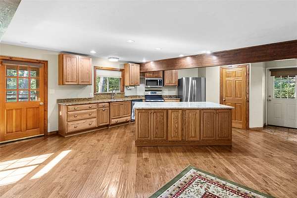 5 Acres of Land with Home for Sale in Columbia Falls, Montana