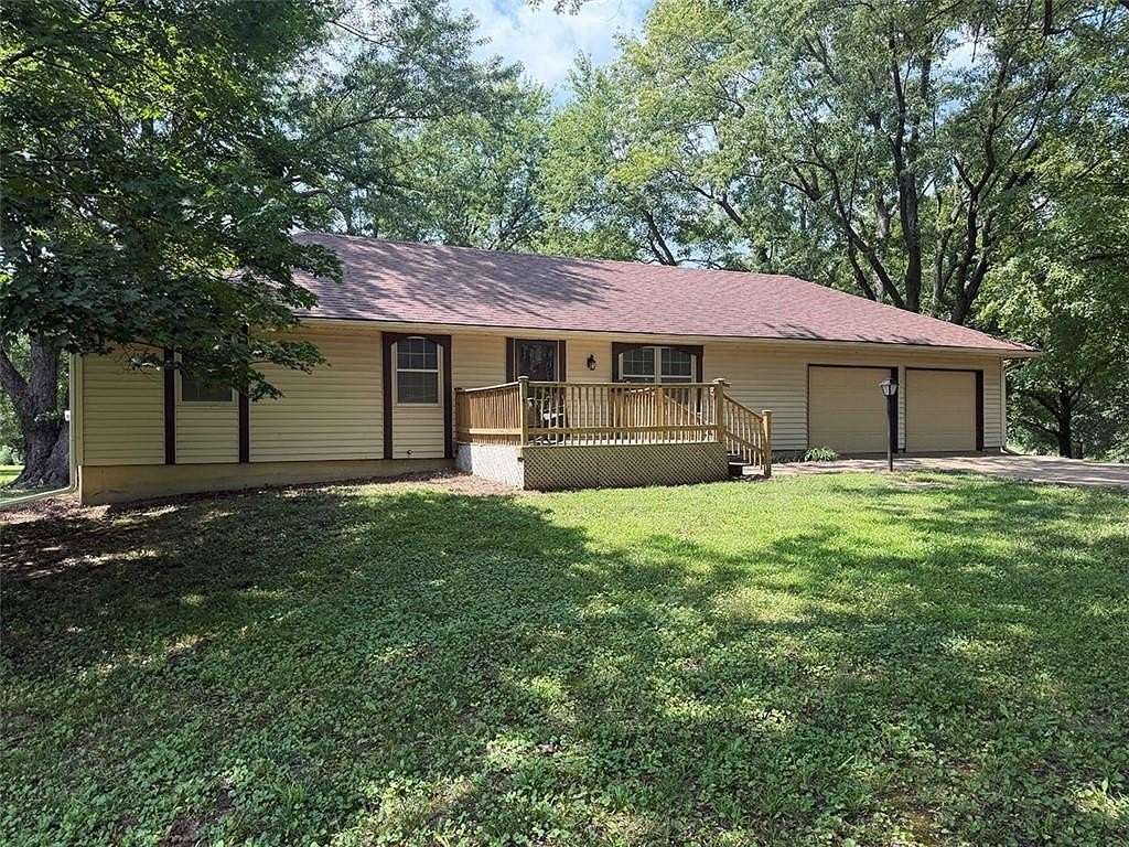 7.52 Acres of Land with Home for Sale in Buckner, Missouri