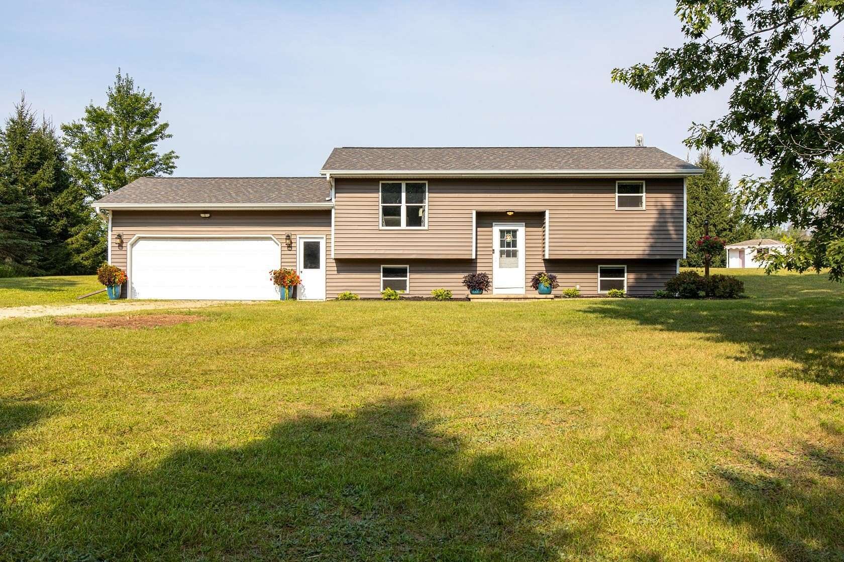 1.5 Acres of Land with Home for Sale in New London, Wisconsin