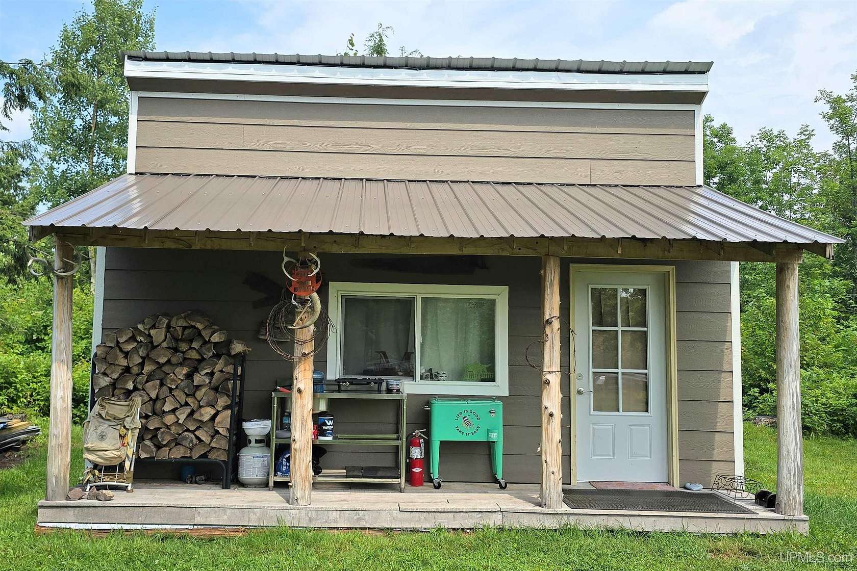 60 Acres of Recreational Land with Home for Sale in Baraga, Michigan