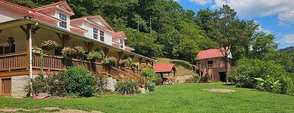 4.82 Acres of Land with Home for Sale in Warfield, Kentucky
