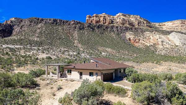 50.8 Acres of Recreational Land with Home for Sale in Grand Junction, Colorado