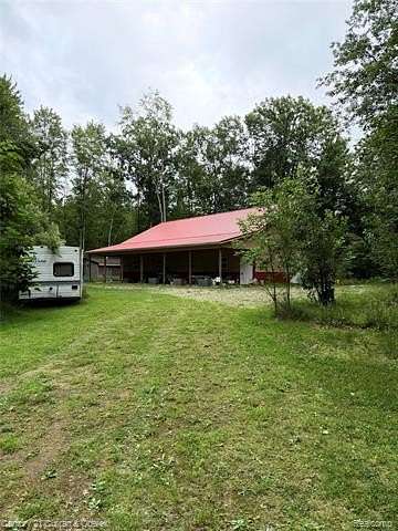 4.66 Acres of Land with Home for Sale in Wells Township, Michigan