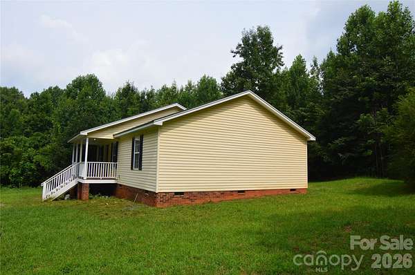 15.4 Acres of Recreational Land with Home for Sale in Crouse, North Carolina