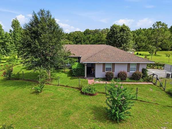 4.78 Acres of Land with Home for Sale in Chiefland, Florida