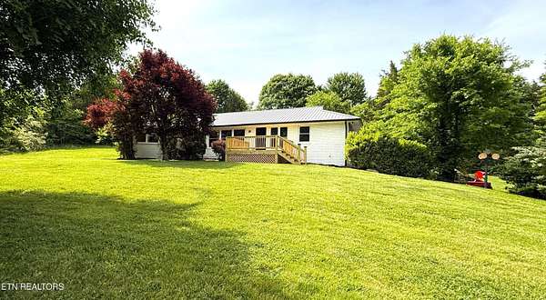 4.8 Acres of Land with Home for Sale in Strawberry Plains, Tennessee