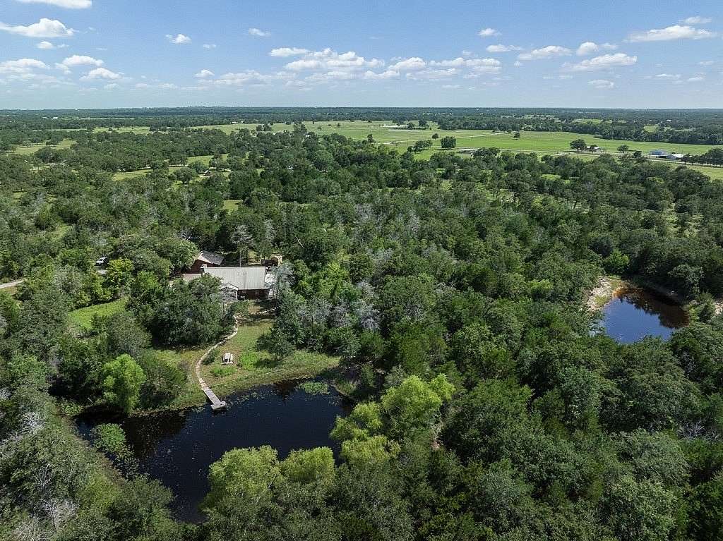 21.4 Acres of Recreational Land with Home for Sale in Carmine, Texas