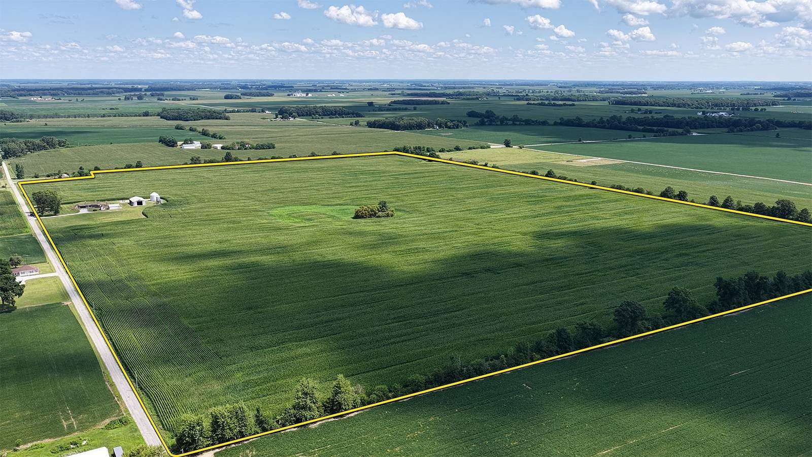 106 Acres of Agricultural Land with Home for Auction in Royal Center, Indiana