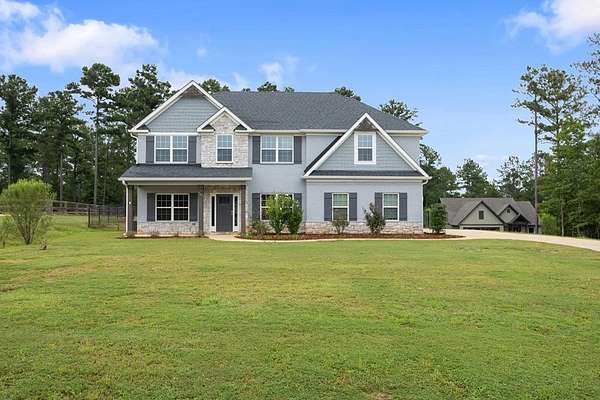 2.23 Acres of Land with Home for Sale in Ellerslie, Georgia