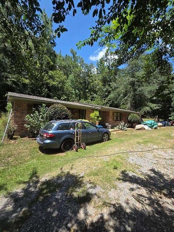 6.6 Acres of Land with Home for Sale in Wetumpka, Alabama