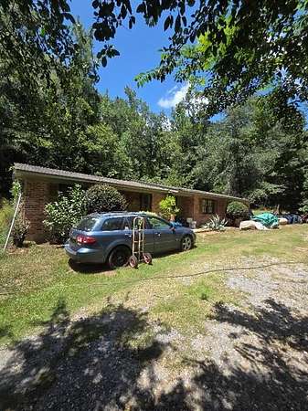 6.6 Acres of Land with Home for Sale in Wetumpka, Alabama