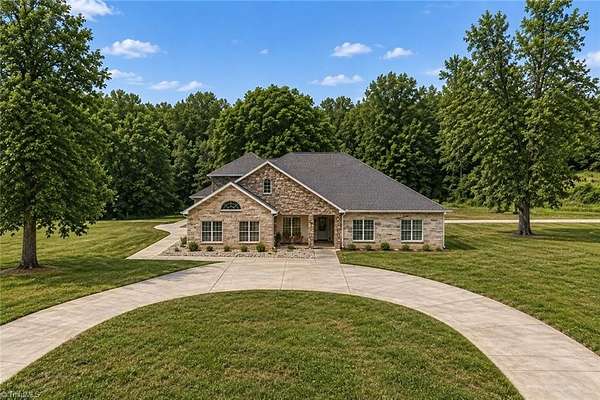 7.89 Acres of Land with Home for Sale in Rural Hall, North Carolina