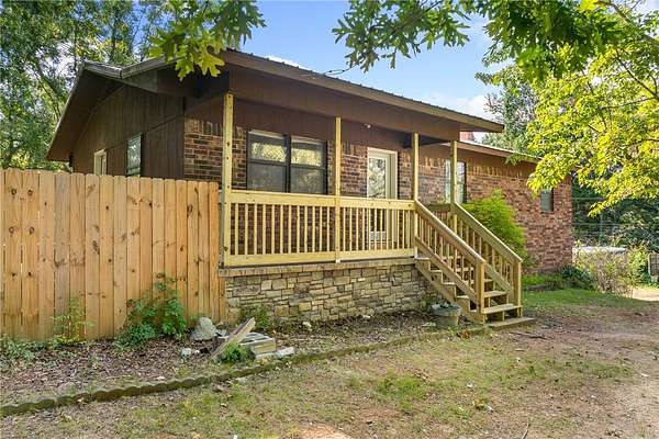 2.44 Acres of Land with Home for Sale in Harrison, Arkansas