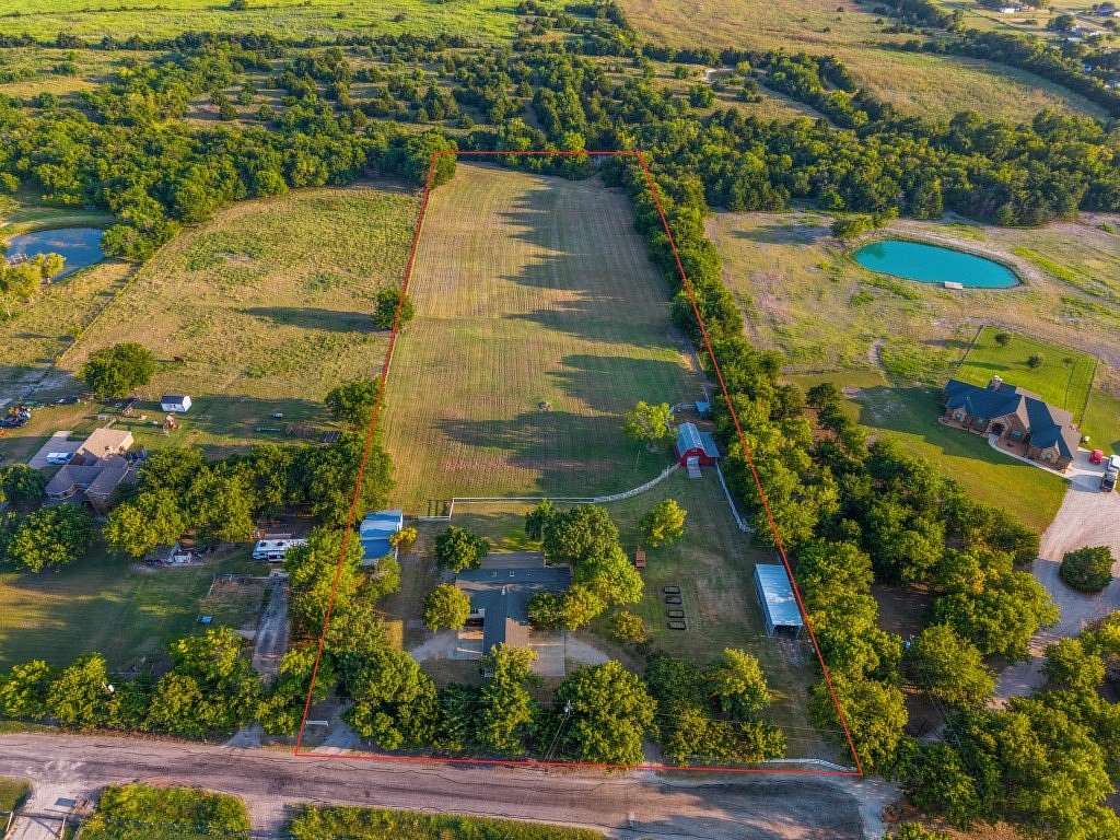 5.57 Acres of Land with Home for Sale in Royse City, Texas