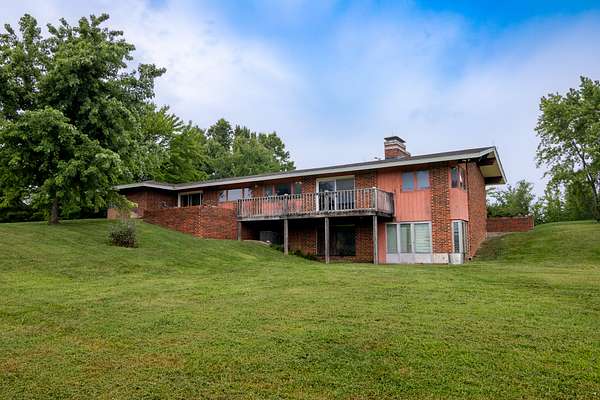 66 Acres of Land with Home for Auction in Cameron, Missouri
