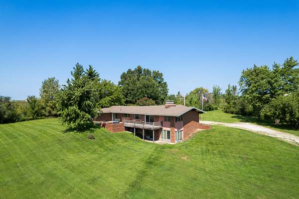 66 Acres of Land with Home for Auction in Cameron, Missouri