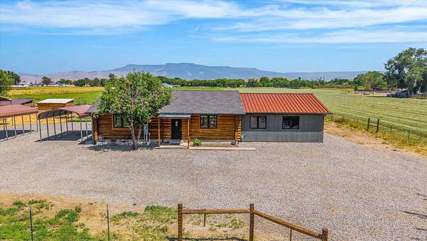 10 Acres of Land with Home for Sale in Grand Junction, Colorado