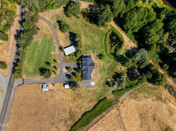 4.32 Acres of Land with Home for Sale in Grants Pass, Oregon