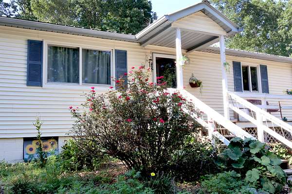5.4 Acres of Land with Home for Sale in Springville, Tennessee