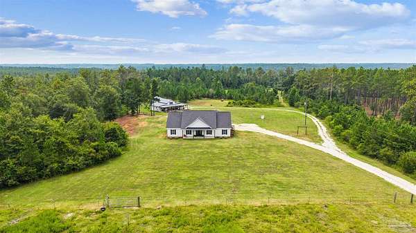 20 Acres of Agricultural Land with Home for Sale in Century, Florida