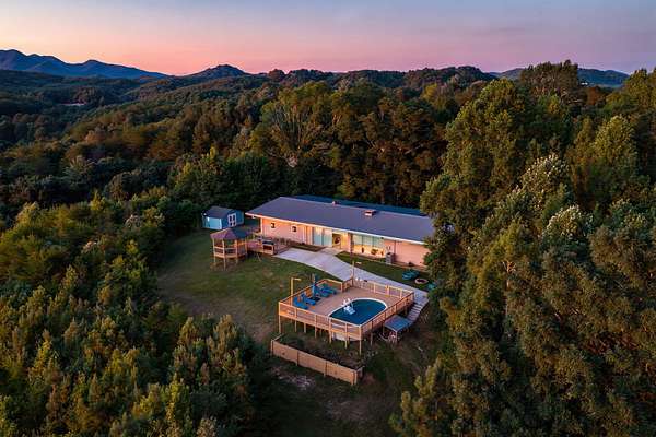 8.33 Acres of Land with Home for Sale in Copperhill, Tennessee