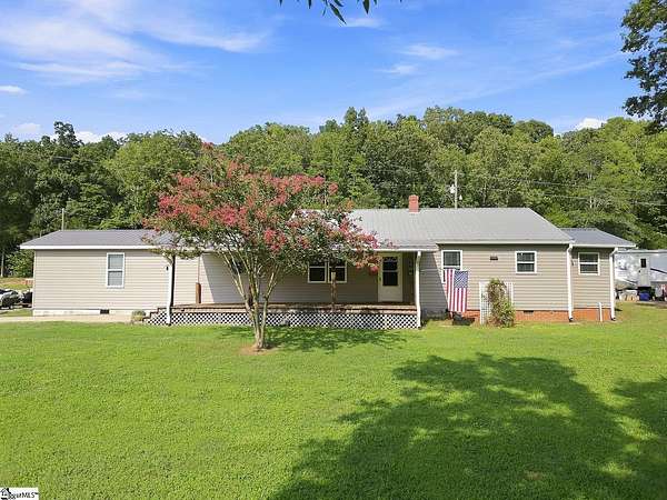 9.4 Acres of Land with Home for Sale in Clinton, South Carolina