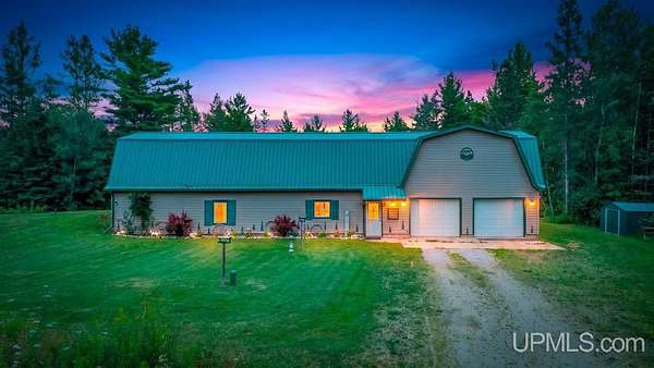 172 Acres of Recreational Land with Home for Sale in Rapid River, Michigan