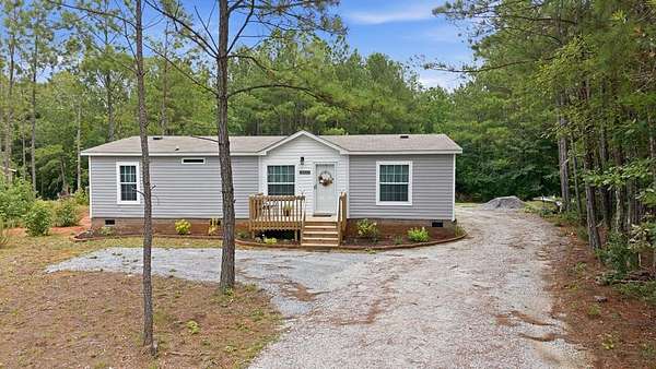 2.47 Acres of Land with Home for Sale in Waterloo, South Carolina