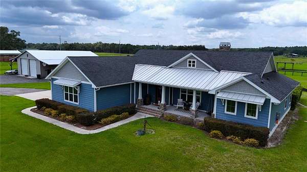 10.4 Acres of Land with Home for Sale in Oxford, Florida
