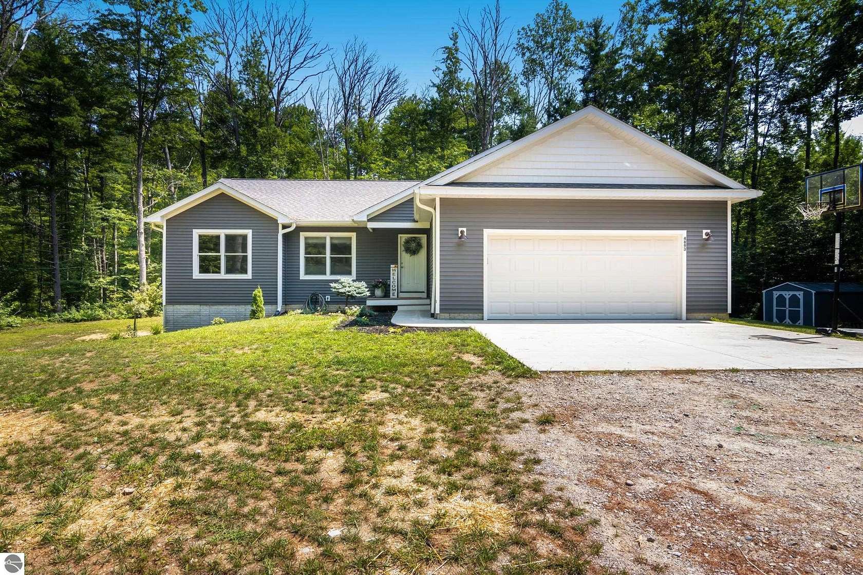 7.83 Acres of Land with Home for Sale in Interlochen, Michigan