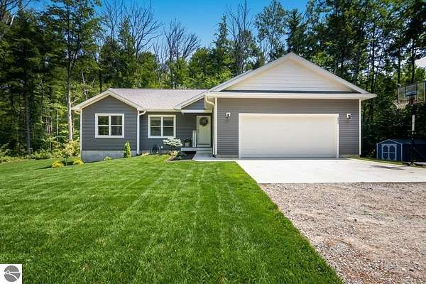 7.83 Acres of Land with Home for Sale in Interlochen, Michigan