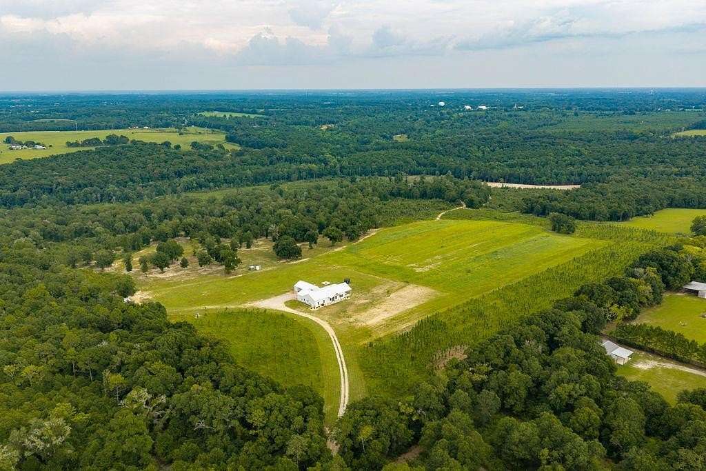 110 Acres of Agricultural Land with Home for Sale in Newton, Alabama