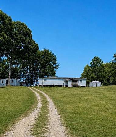 1.6 Acres of Land with Home for Sale in Goodwater, Alabama