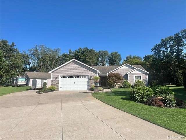 2 Acres of Land with Home for Sale in Highland Township, Michigan