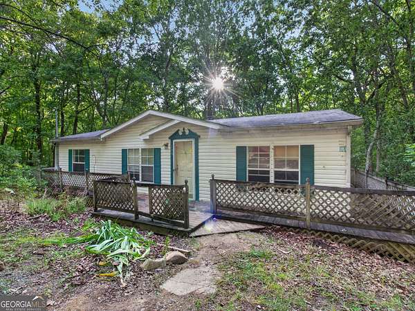 6.47 Acres of Land with Home for Sale in Jasper, Georgia
