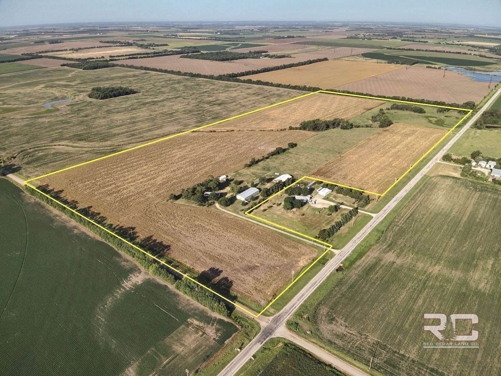 73.3 Acres of Agricultural Land with Home for Auction in McPherson, Kansas