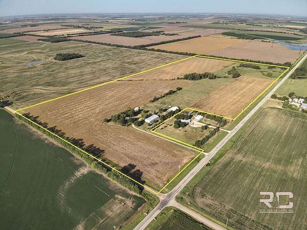 73.3 Acres of Agricultural Land with Home for Auction in McPherson, Kansas