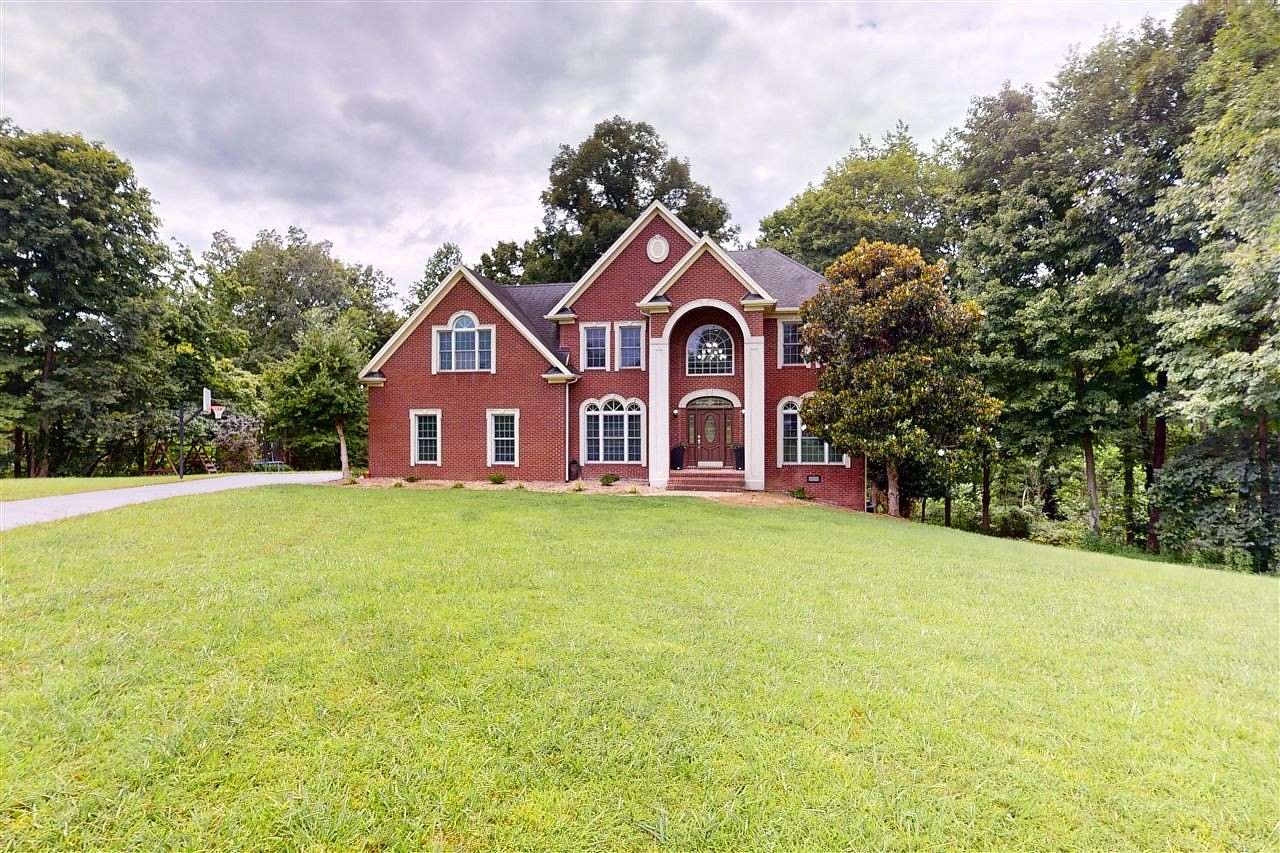 10.2 Acres of Land with Home for Sale in Scottsville, Kentucky